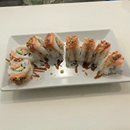 Foto di uramaki al salmone cotto